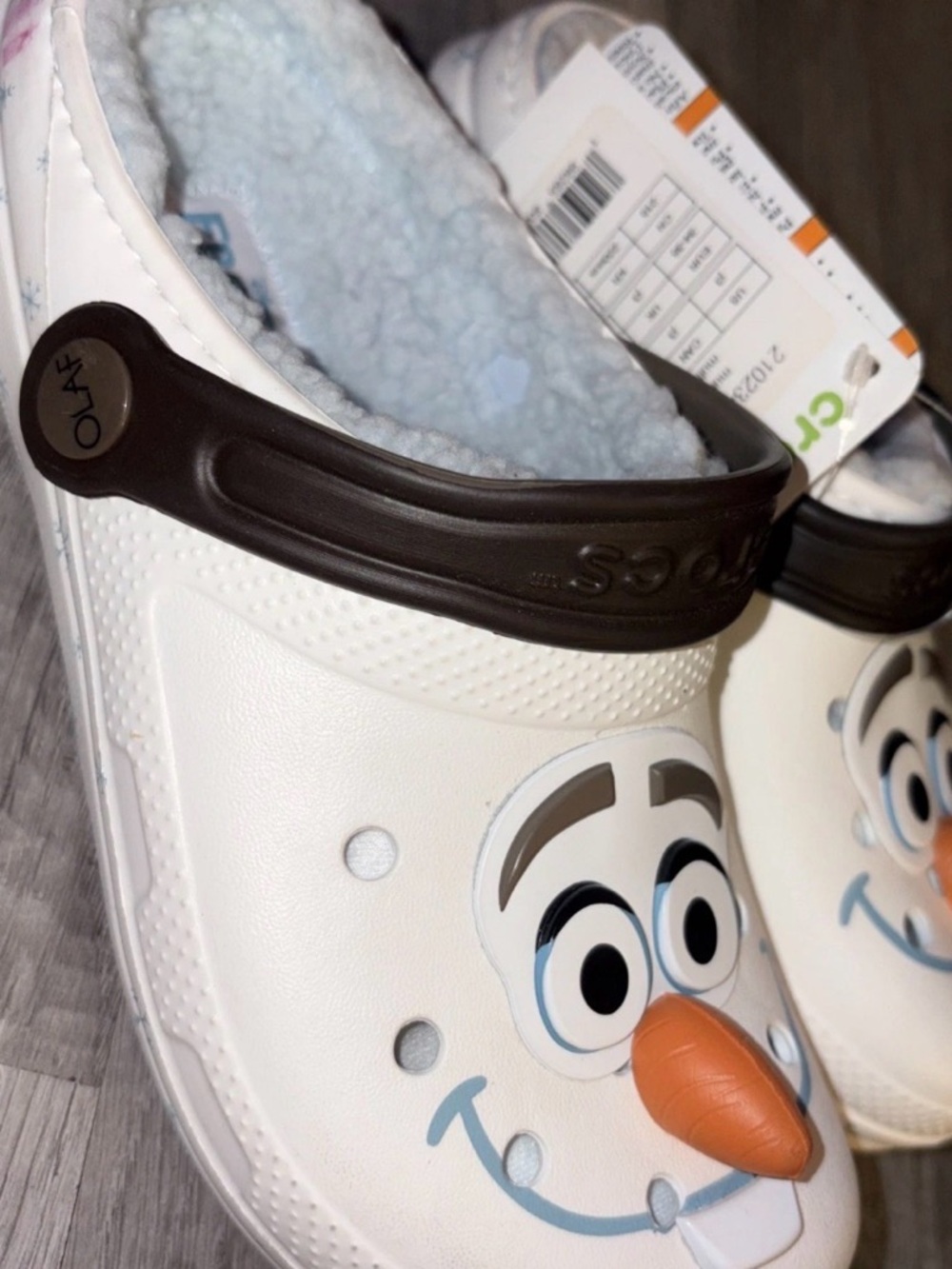 CROCS Kids Olaf Clogs in White with Brown Strap and Orange Nose